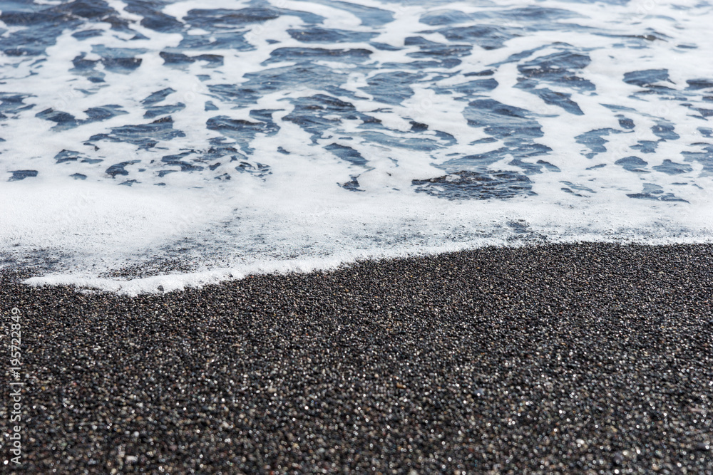 Beach with black sand on the island of Santorini Beach with black sand on the island of Santorini