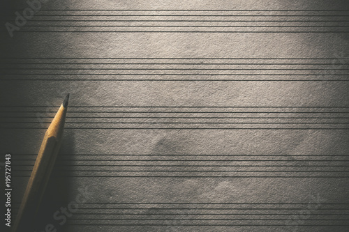 Pencil on the blank sheet music