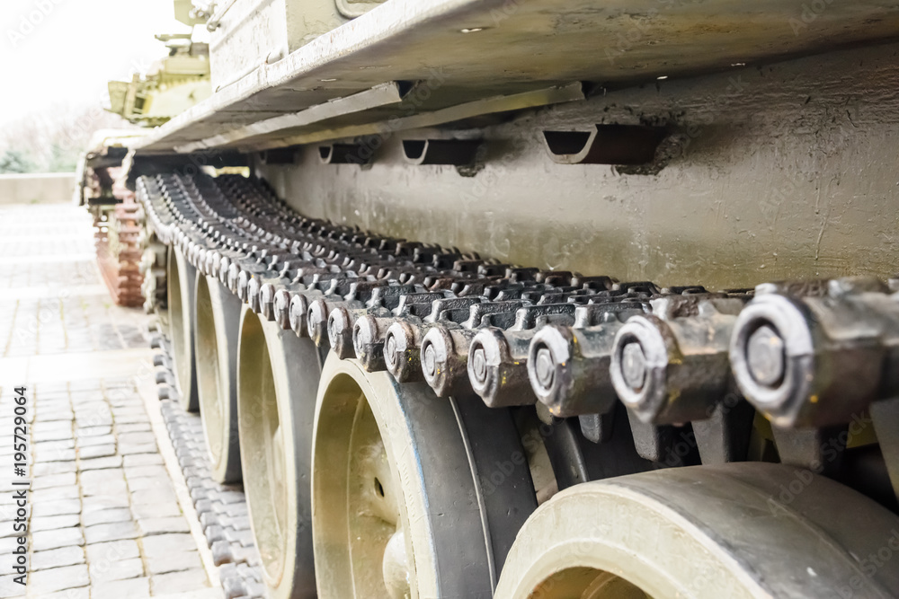 Caterpillar of a military tank or excavator. Close-up photo Caterpillar of a military tank or excavator. Close-up photo