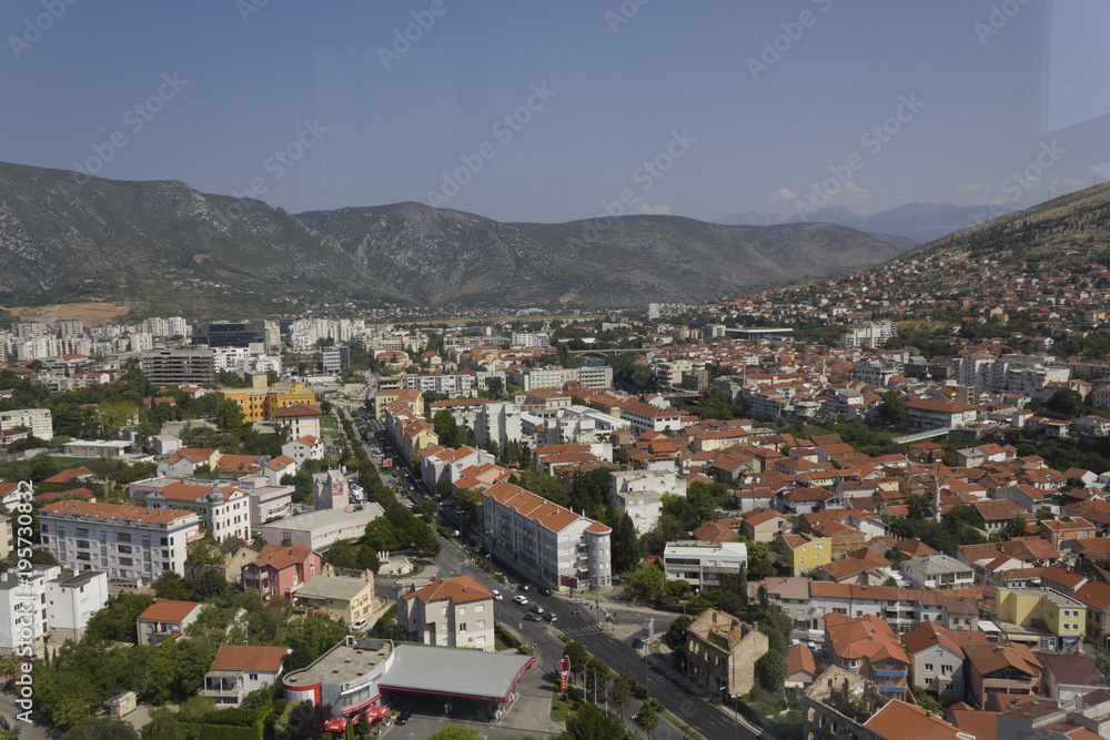 View from the top ofthe city of Mostar, surrounded by mountains