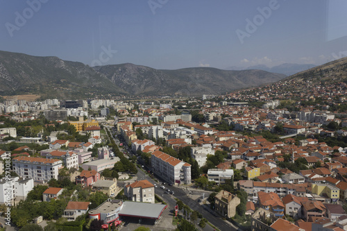 View from the top ofthe city of Mostar, surrounded by mountains