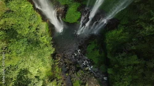Aerial view of Waterfall in green rainforest