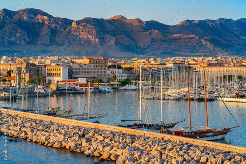 Sunrise at Mediterranian sea and port in Palermo old city photo