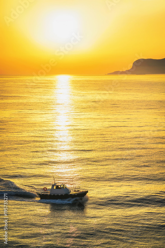 Sunrise and ship in Mediterranian sea in Palermo © Roman Babakin