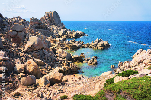 People on beach at Mediterranean Sea at Santa Teresa Gallura photo