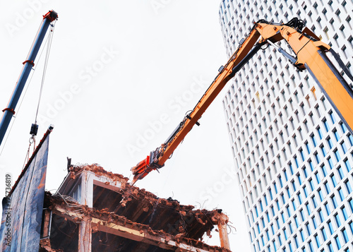 Breaking roof of house in Berlin photo