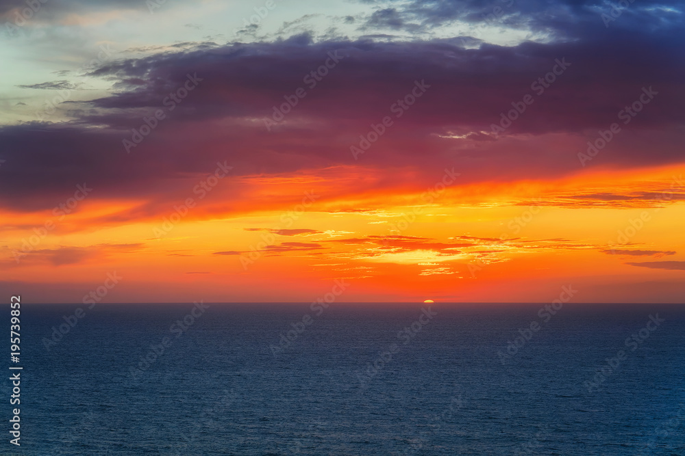 Idyllic sunset over Mediterranean sea at Portoscuso Carbonia Sardinia