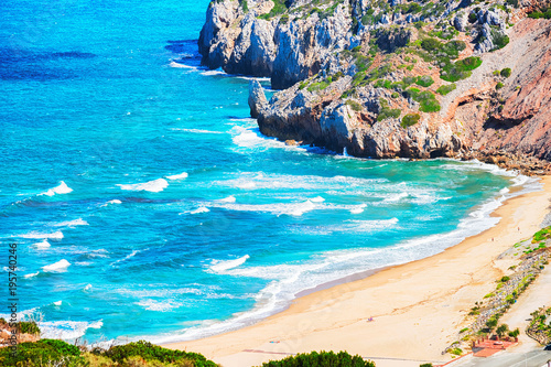 Cala Domestica beach in Buggerru resort in Mediterranean Sea Sardinia