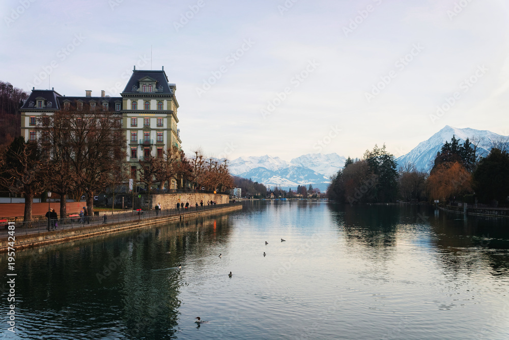 Obraz premium Embankment and mountains in Old Town Thun Switzerland
