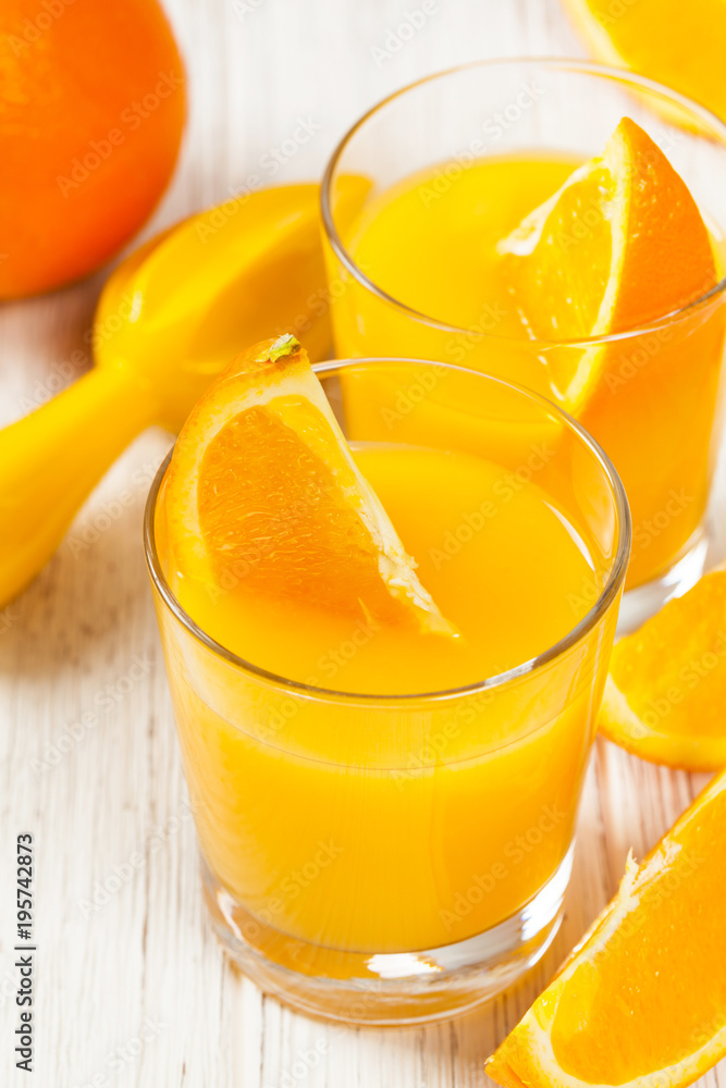 Orange Juice on wooden background. Selective focus. Orange Juice on wooden background. Selective focus.