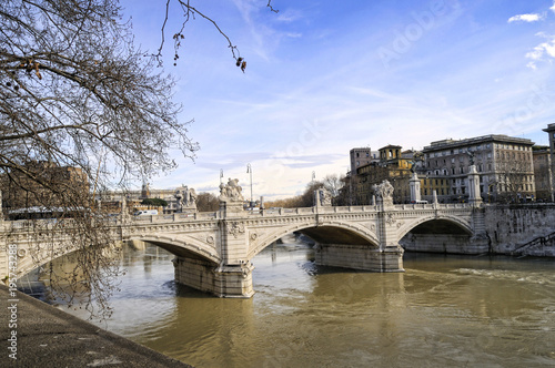 One of the fine bridges across the River Tiber in Rome Italy