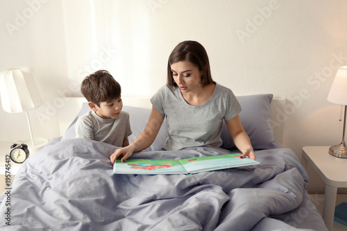 Mother reading bedtime stor...