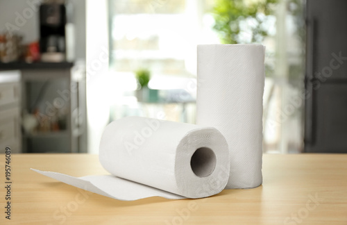 Rolls of paper towels on ta...