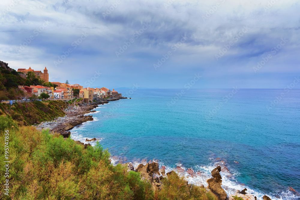 Old houses on Rocky Coast in Cefalu Sicily