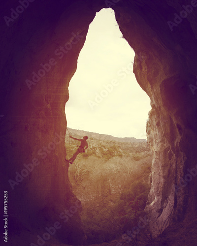 Rock-climbing in Turkey. The climber climbs on the route. Photo from the top.