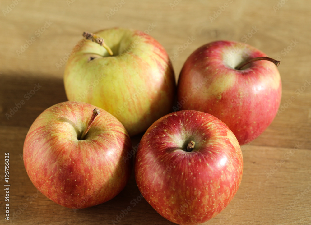 fresh red and yellow Japanese fuji apples on wooden background fresh red and yellow Japanese fuji apples on wooden background