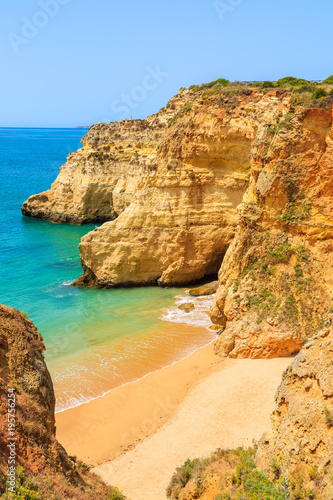 View of beautiful beach with rocks near Portimao town, Algarve, Portugal