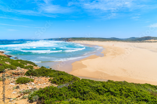 View of beautiful Praia da Bordeira beach  popular place to do kite surfing  Algarve  Portugal