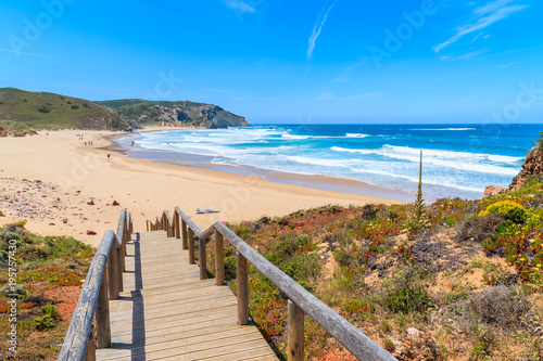 Walkway to beautiful Praia do Amado beach  popular place to do water sports  Algarve  Portugal