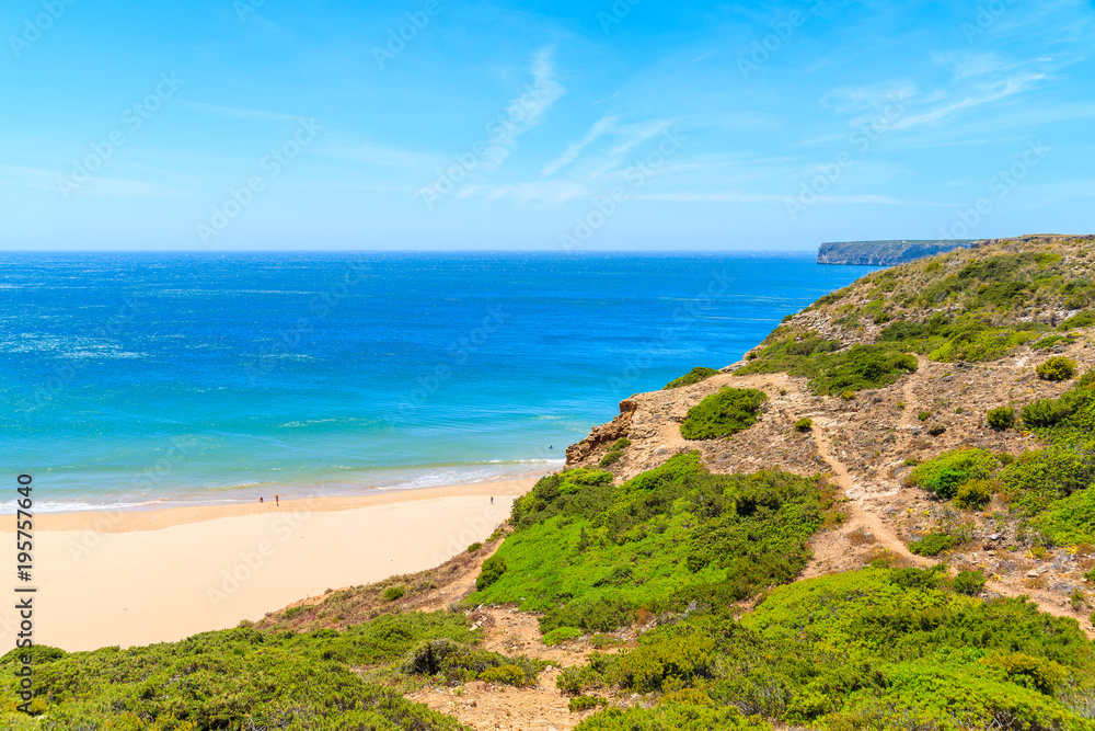 Beautiful bay and sandy beach of Praia do Beliche near Cabo Sao Vicente, Algarve region, Portugal