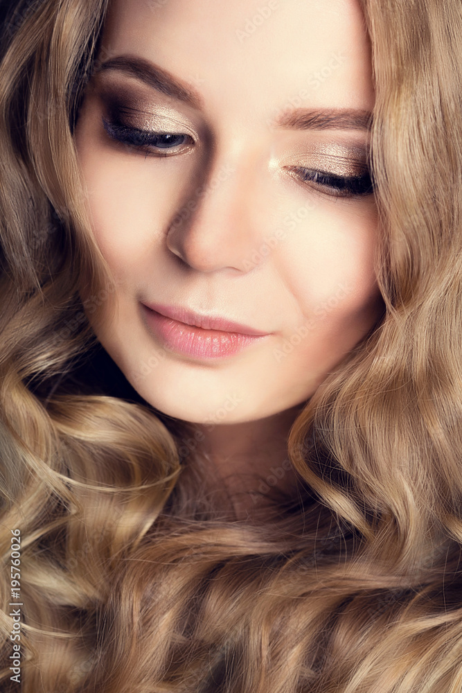 Beautiful young girl with evening make-up. Closed eyes, portrait