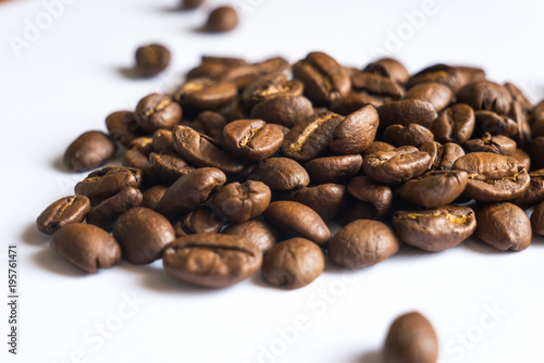 Coffee beans on white background, close up