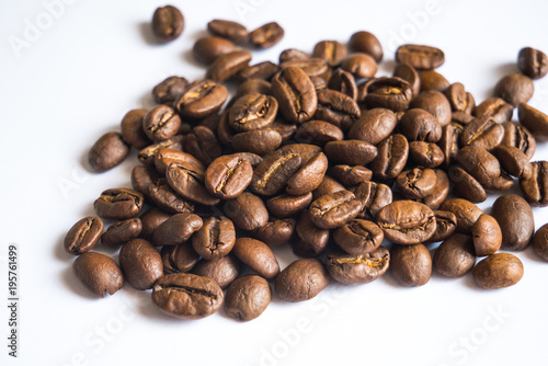 Coffee beans on white background, close up