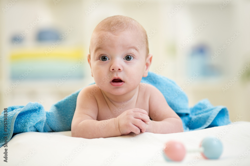 cute baby boy laying down