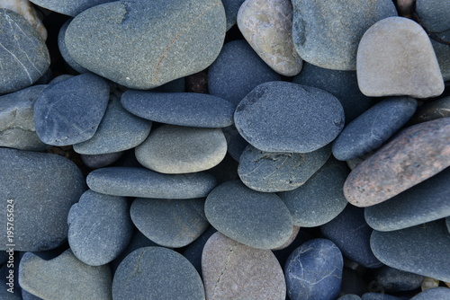 Pebble beach, Jersey, U.K.
Abstract slate colored stones.