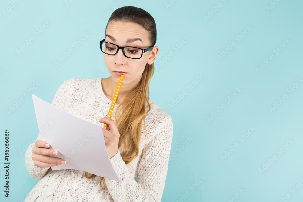 Attractive woman with ponytail and paper sheet Attractive woman with ponytail and paper sheet