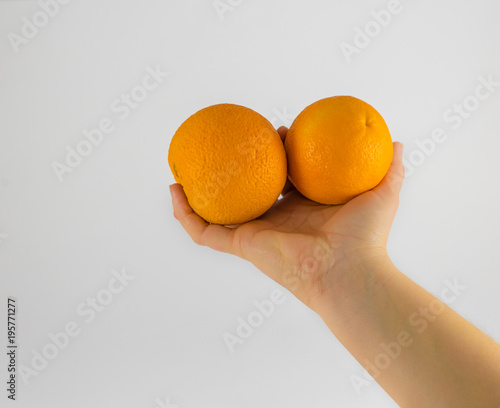 woman's hands with citrus