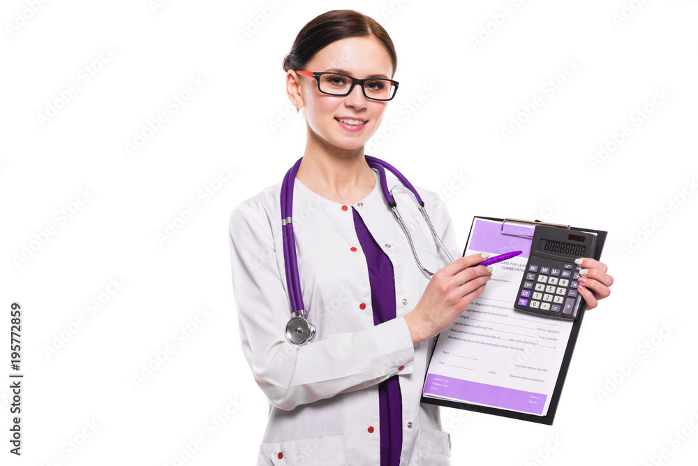 Young beautiful female doctor holding clipboard and calculator in her hands on white background Young beautiful female doctor holding clipboard and calculator in her hands on white background