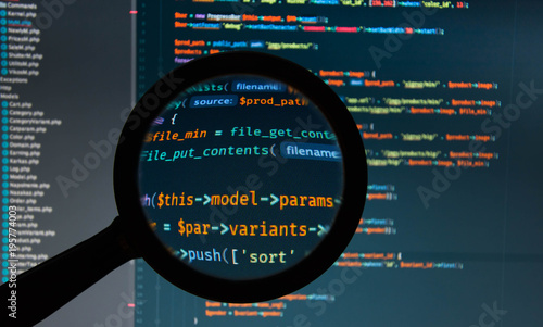 Wallpaper Mural Php code under loupe on the screen of laptop Torontodigital.ca