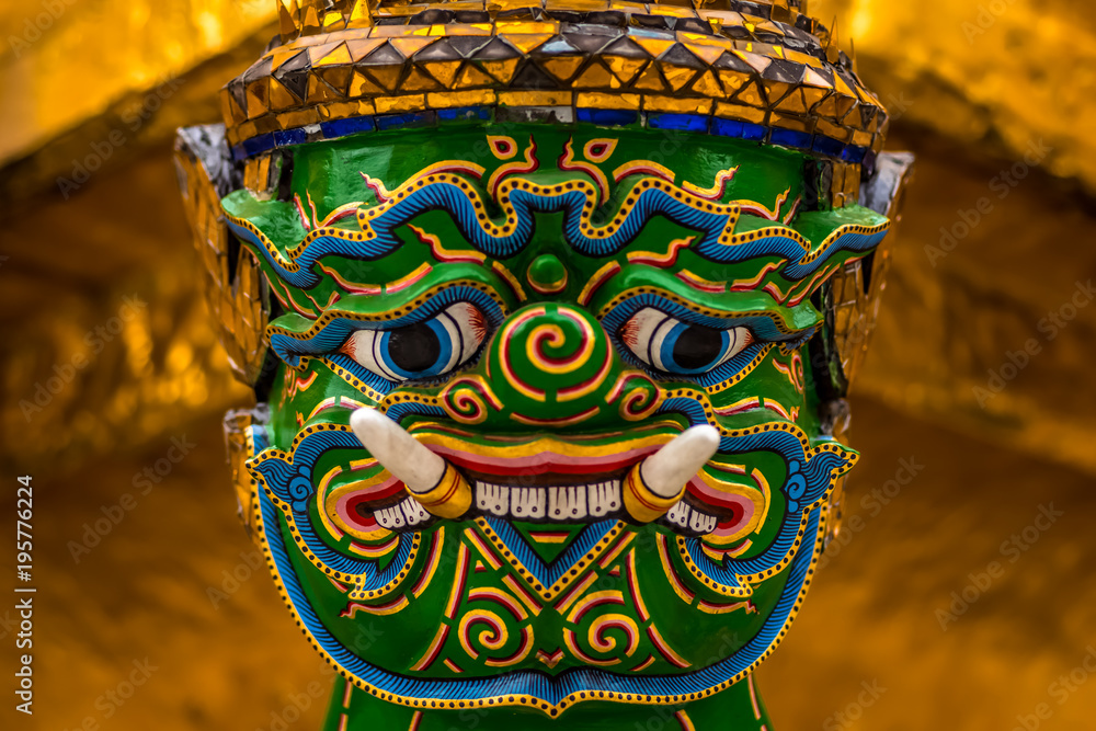 Fototapeta premium Clouse-up of Yak Face, common as guardians of the gates in Buddhist temples, Grand Palace, Bangkok