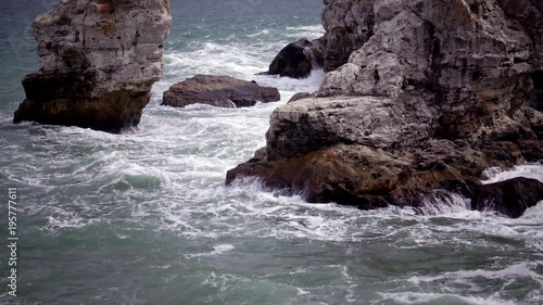 Storm on the sea in the Black Sea, stone coast, Bulgaria, near the village of Tyulenovo photo