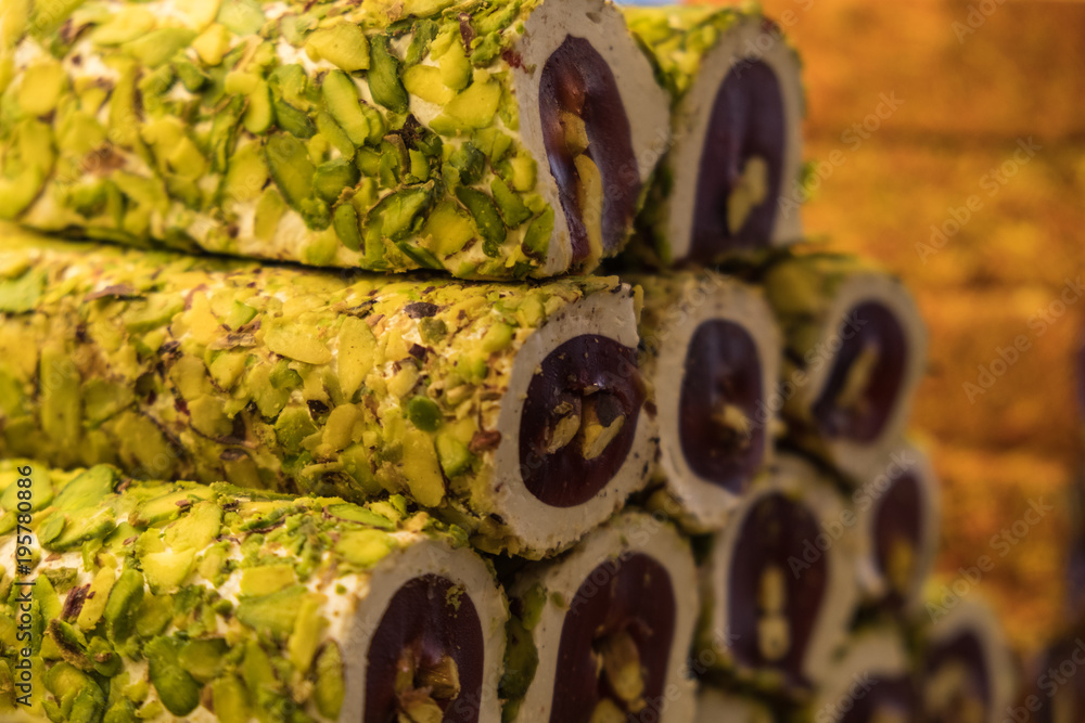 Fototapeta premium Fresh homemade traditional Turkish delight bars with pistachios
