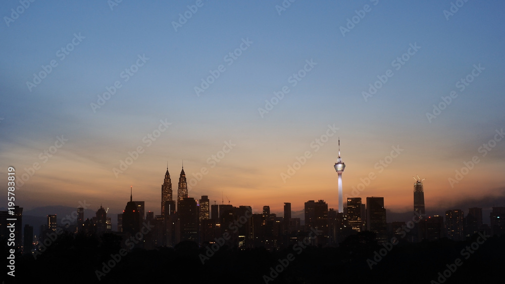 Amazing view of Kuala Lumpur city skyline sunrise.
