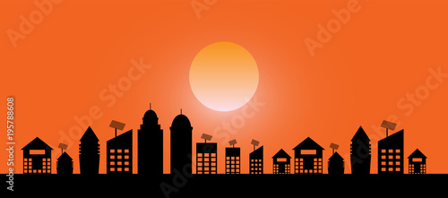 landscape evening view of the city with on sundown background