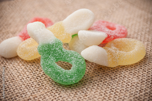Принти на полотні closeup of acidulous candies on hessian background
