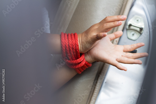Human hand were tied with a rope.Human trafficking concept.woman in violence and discrimination concept