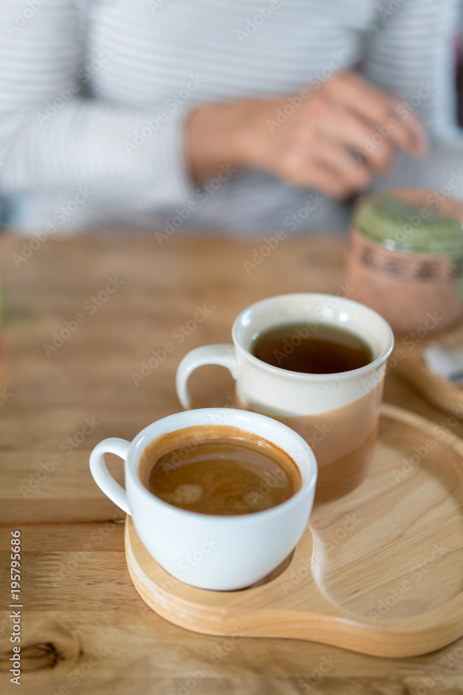 Hot coffee cup on wooden table