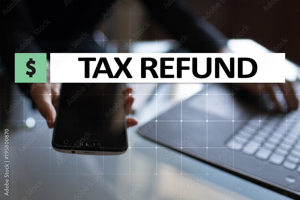 Tax refund text on virtual screen. Business and Finance concept. Tax refund text on virtual screen. Business and Finance concept.