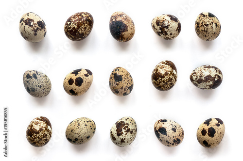 Isolated Quail Eggs Pattern White Background. Top view. 