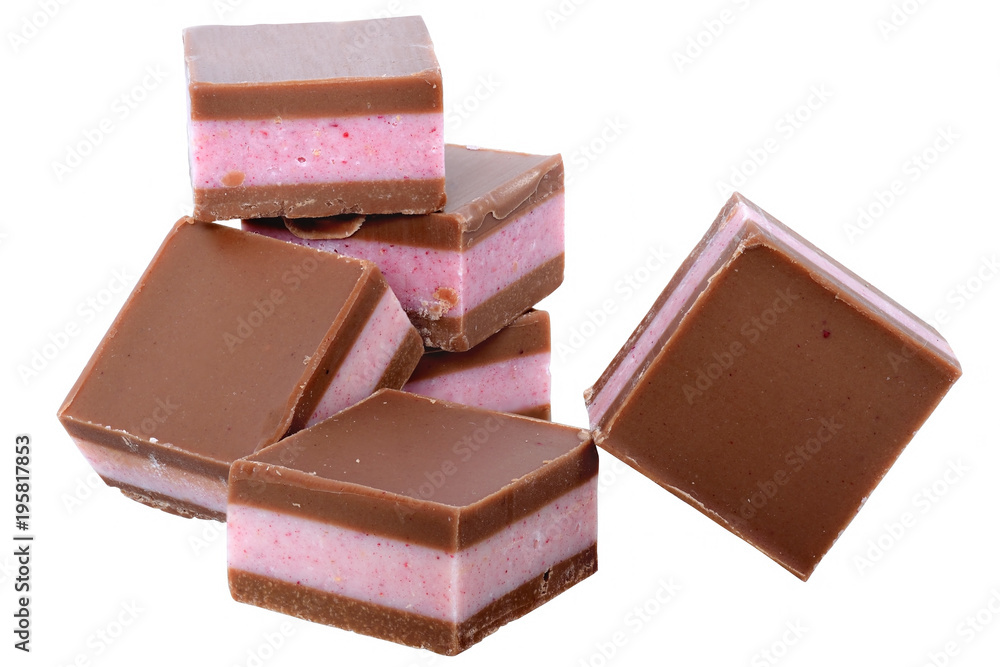 Dark chocolate cubes with fruit berry cream filling isolated Dark chocolate cubes with fruit berry cream filling isolated