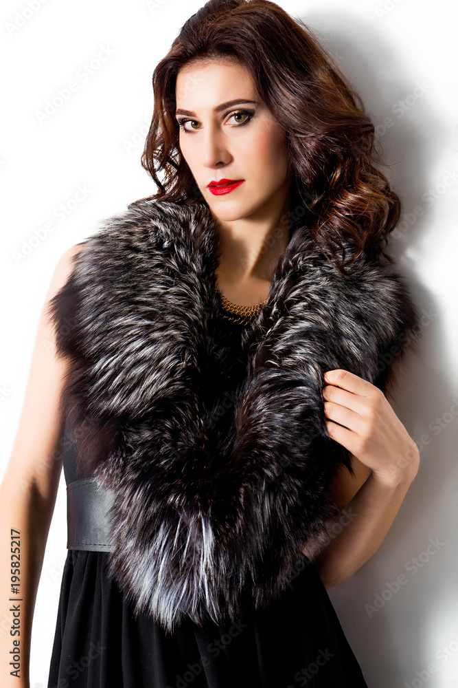 beautiful chic woman in dress and fur collar on white background beautiful chic woman in dress and fur collar on white background