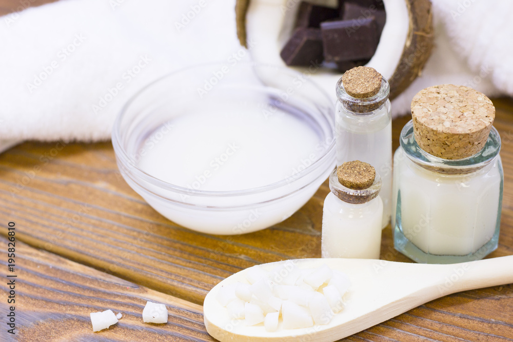 Natural herbal skin care products, top view ingredients coconut, essence oil on table concept of the best all natural face moisturizer. Facial treatment preparation background Natural herbal skin care products, top view ingredients coconut, essence oil on table concept of the best all natural face moisturizer. Facial treatment preparation background