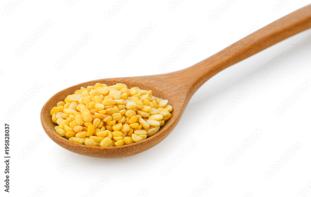 Green beans seeds in wood spoon on white background Green beans seeds in wood spoon on white background
