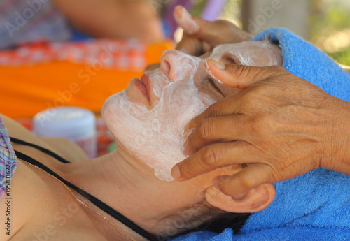 outdoor beach thai face head massage