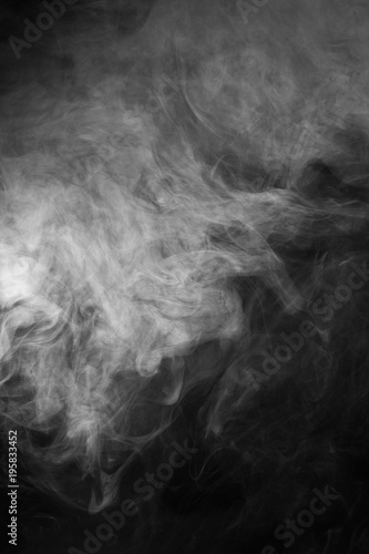 White smoke texture on a black background. Texture and abstract art