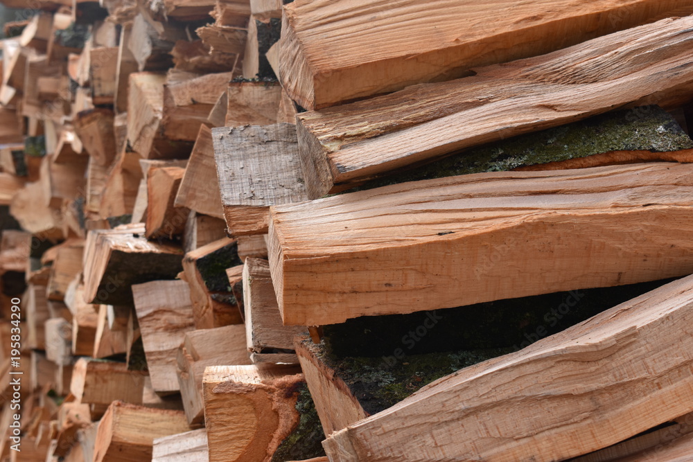 Closeup of brown stacked wood Closeup of brown stacked wood